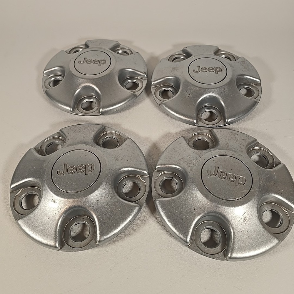 Four Jeep Cherokee Wrangler Liberty OEM Center Hub Caps 1AH90TRMAD Fits 16"